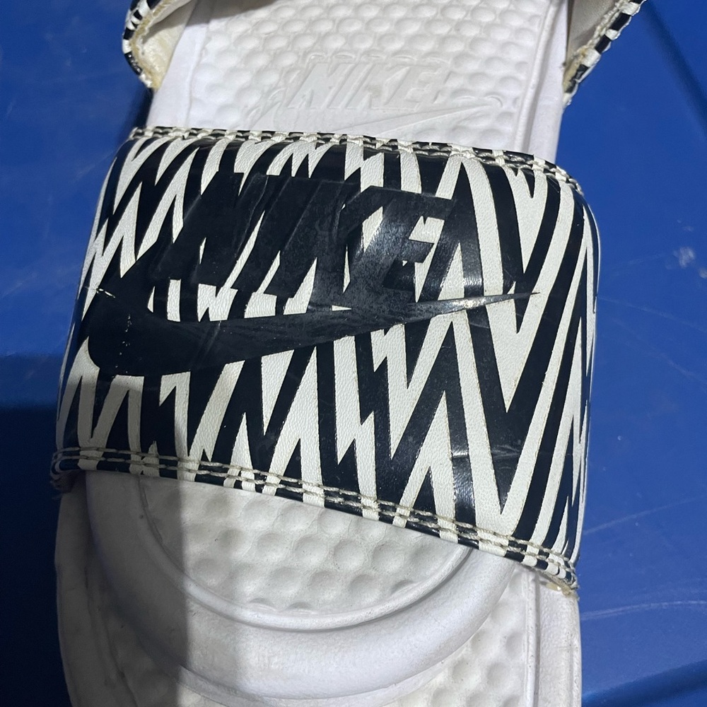 Nike slides size 9 white zebra print